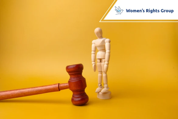 wooden mannequin and gavel